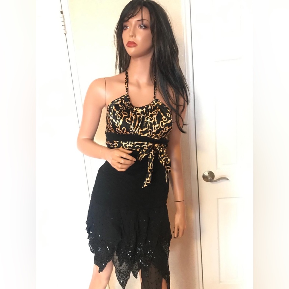 Bebe black halter top with gold buckle pattern design. Sz M, great condition!
